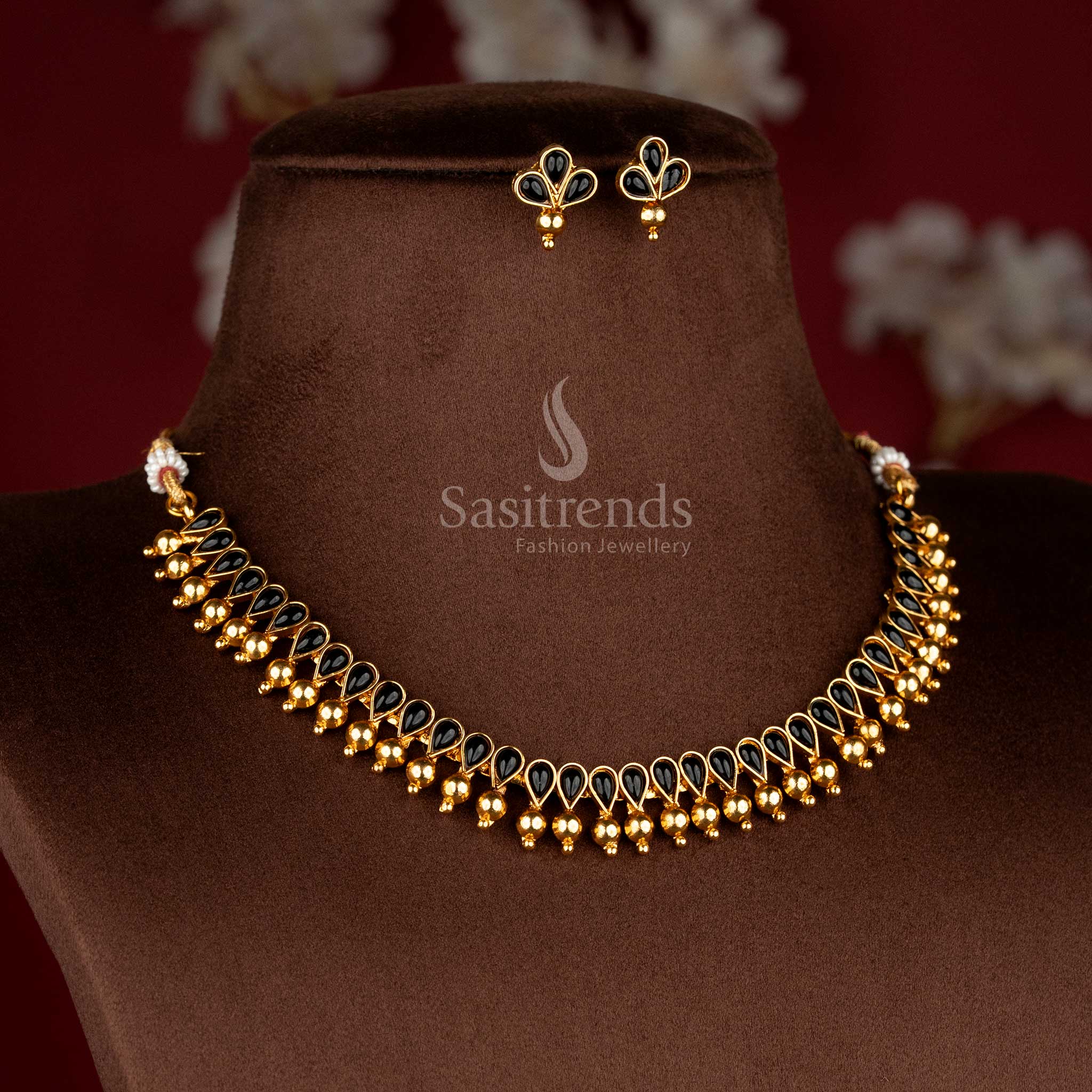 Sasitrends antique matte gold plated structured temple black necklace jewellery set with continuous teardrop stone design and gold bead danglers