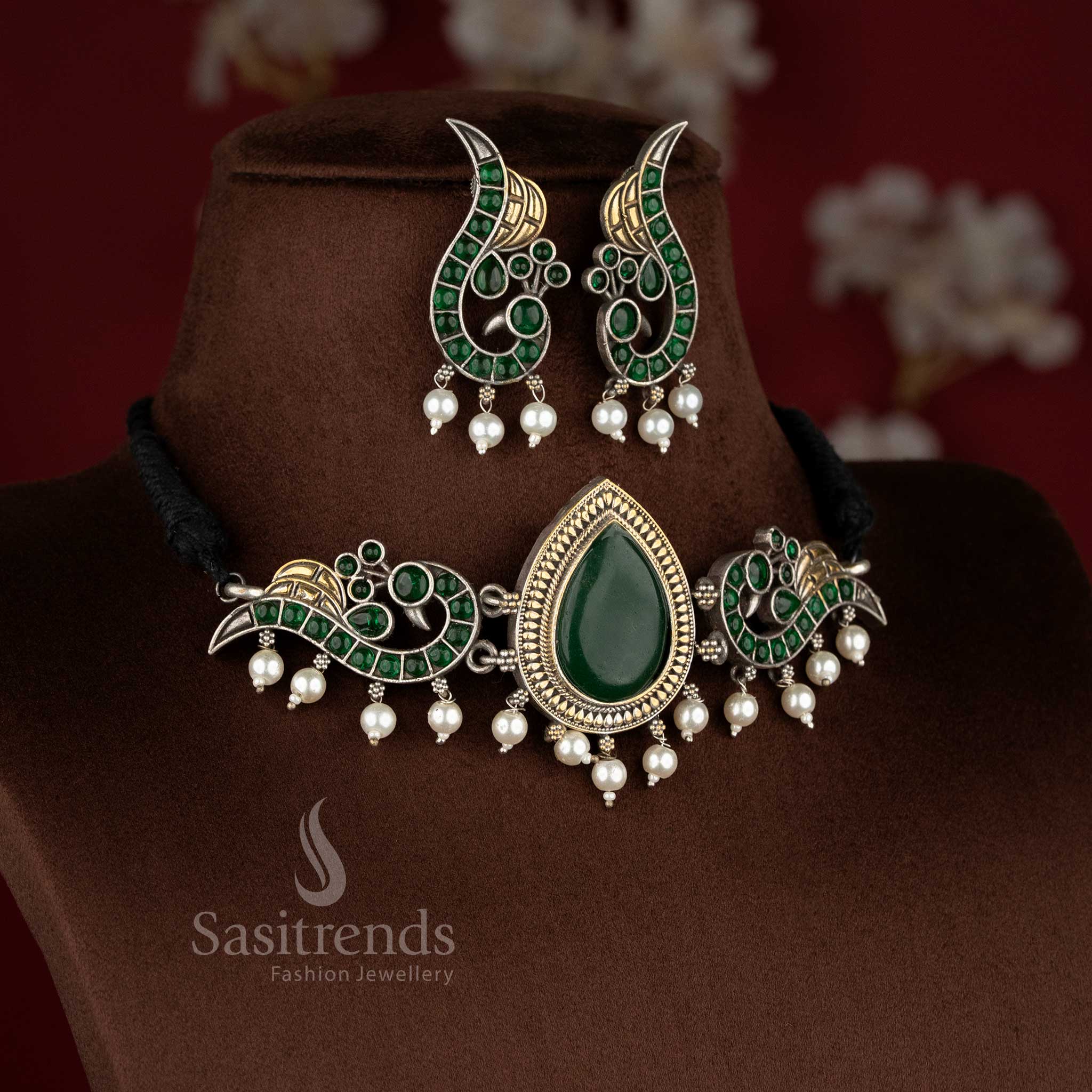 Dual tone antique oxidized 92.5 Silver peacock choker green stone necklace set with heritage structure and pearl drop detailing - Sasitrends