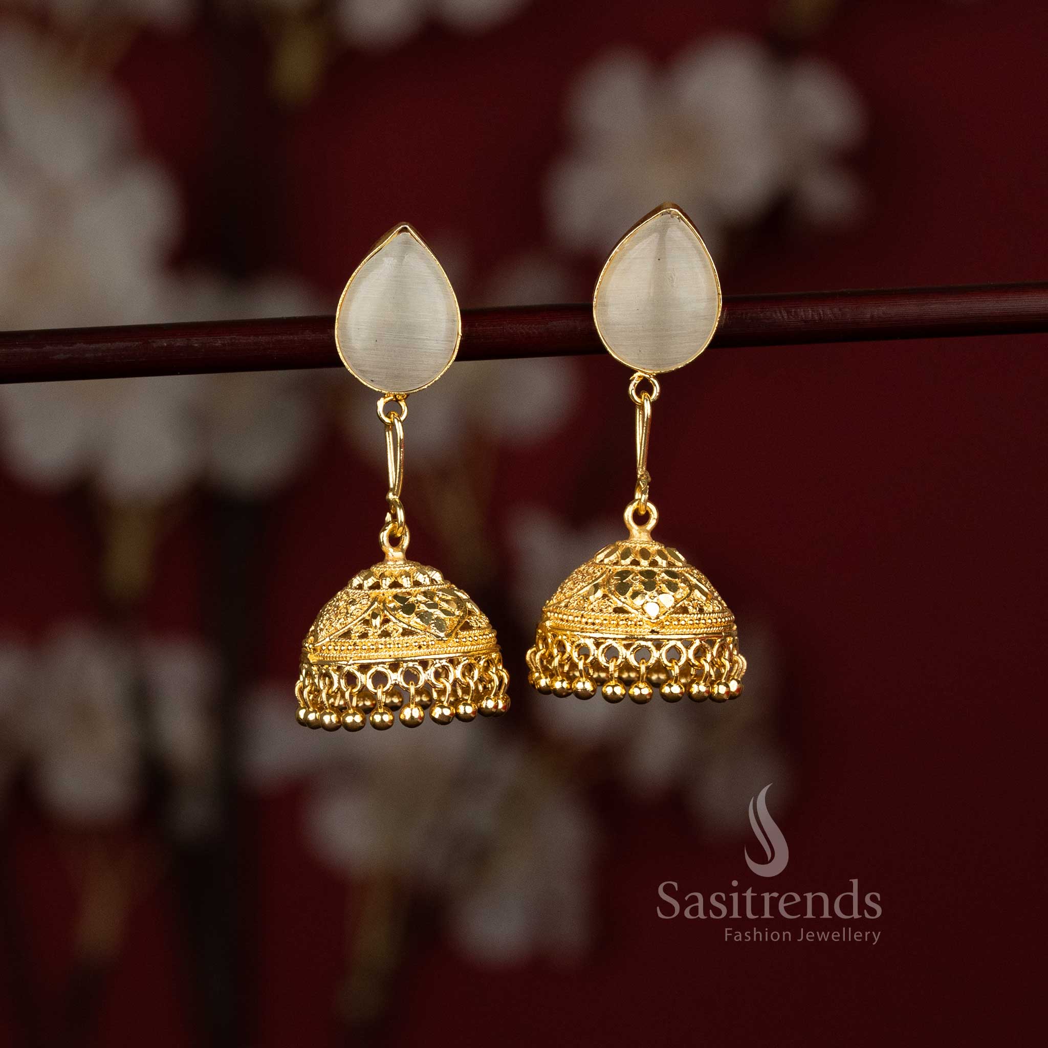 Sasitrends attractive gold plated white pear motif jhumka earrings designed with graceful traditional craftsmanship ideal for fashionable dressing and celebration wear