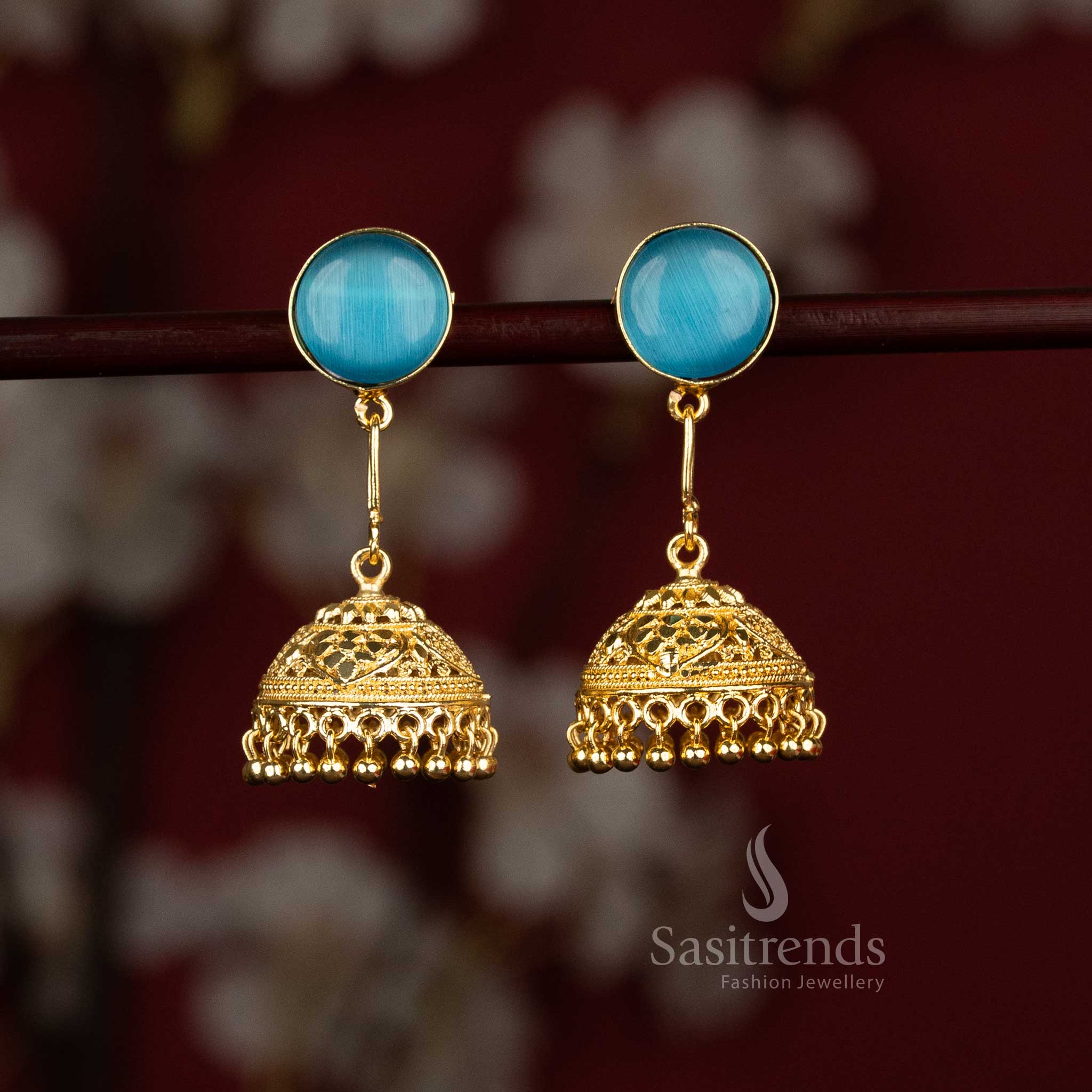 Sasitrends attractive ocean blue round motif gold plated jhumka earrings crafted with graceful bell shaped structure ideal for fashionable styling and celebration outfits 