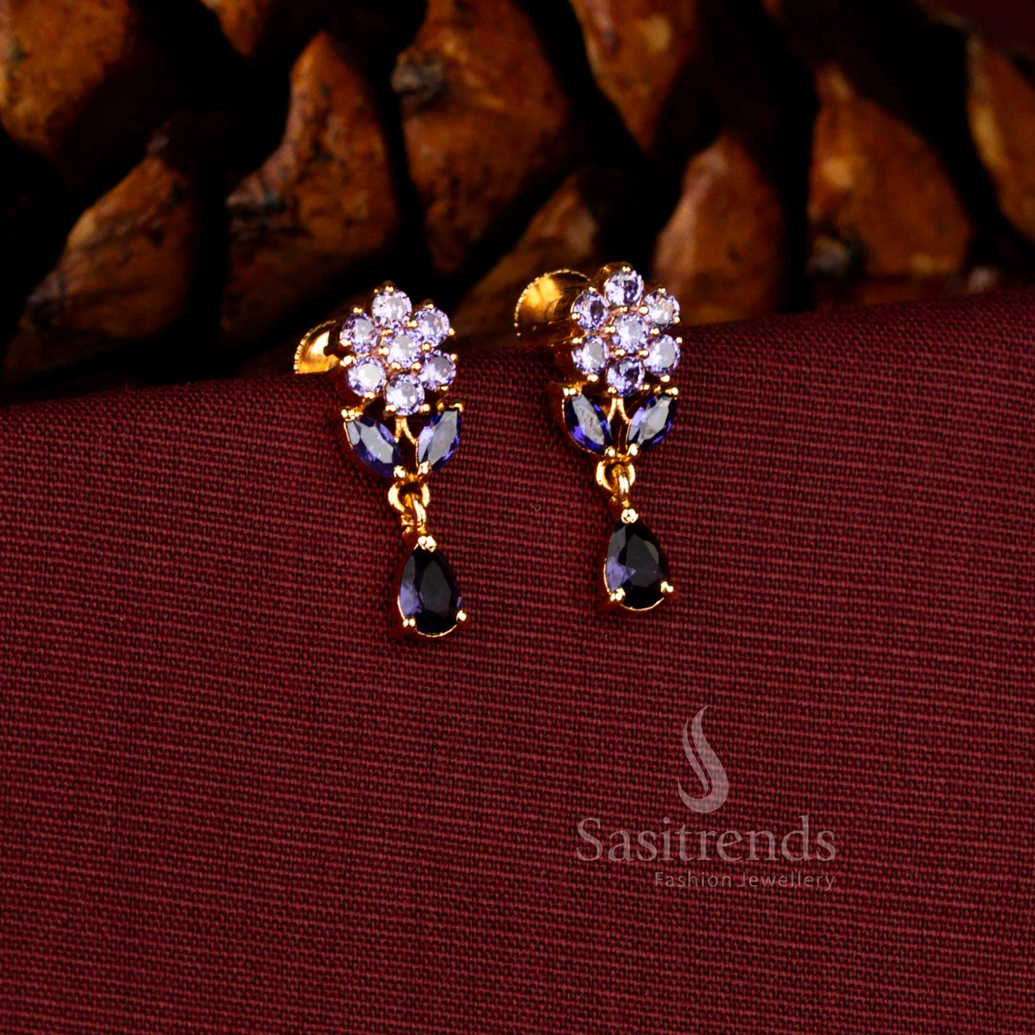 Sasitrends bridal micro gold plated pearl floral cluster earrings featuring a sparkling teardrop purple AD stone stud and guaranteed long-lasting finish ideal for festive and wedding styling.