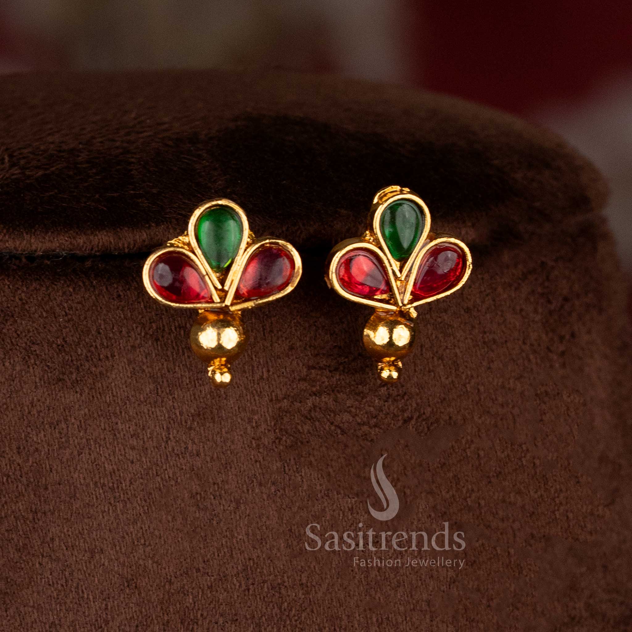 Sasitrends antique matte gold designer teardrop ruby green stone necklace jewellery set with coordinated earrings and temple styling