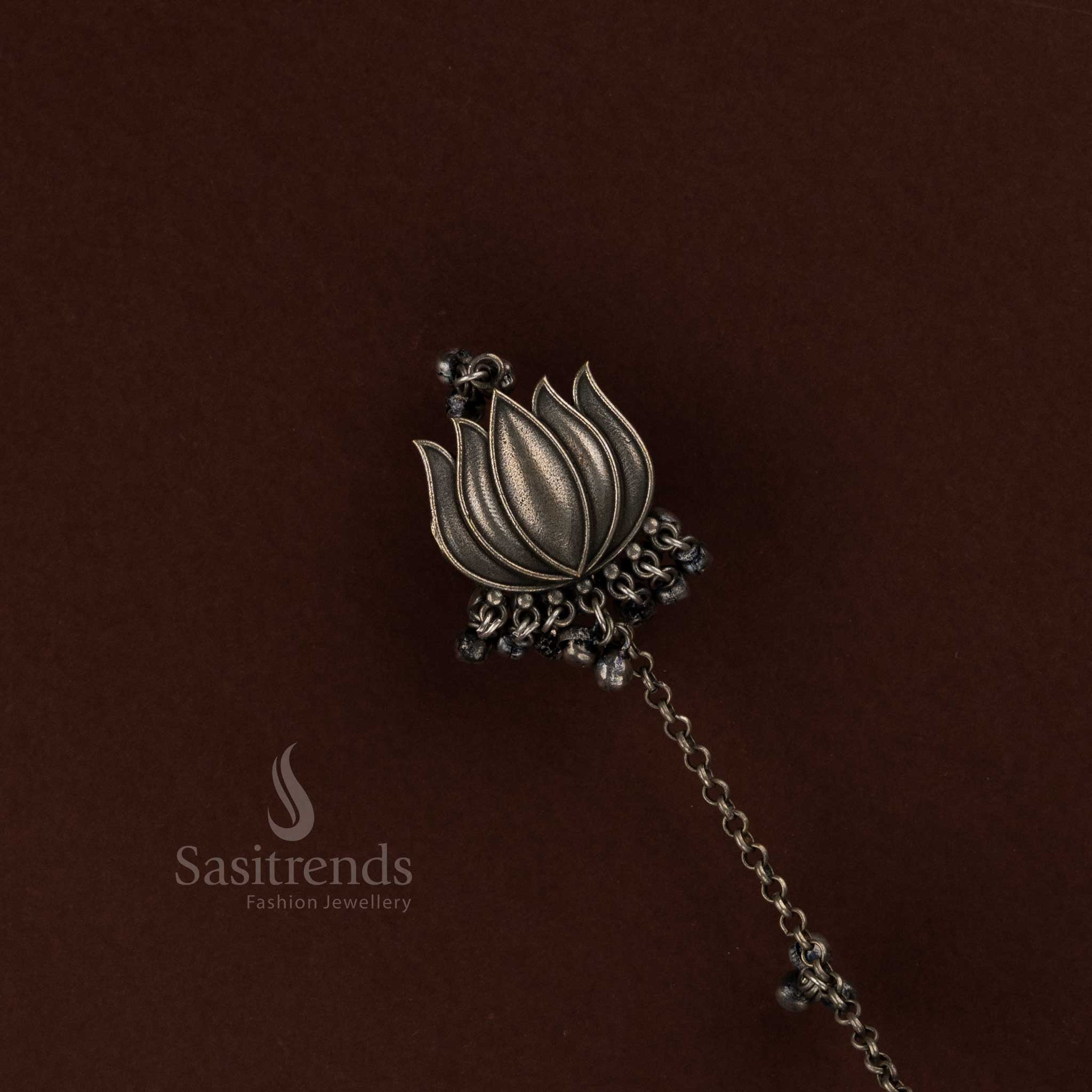 Sasitrends classic oxidised finger ring with designer lotus kada bracelet jewellery featuring elegant ethnic craftsmanship ideal for Navarathri celebrations and traditional cultural attire