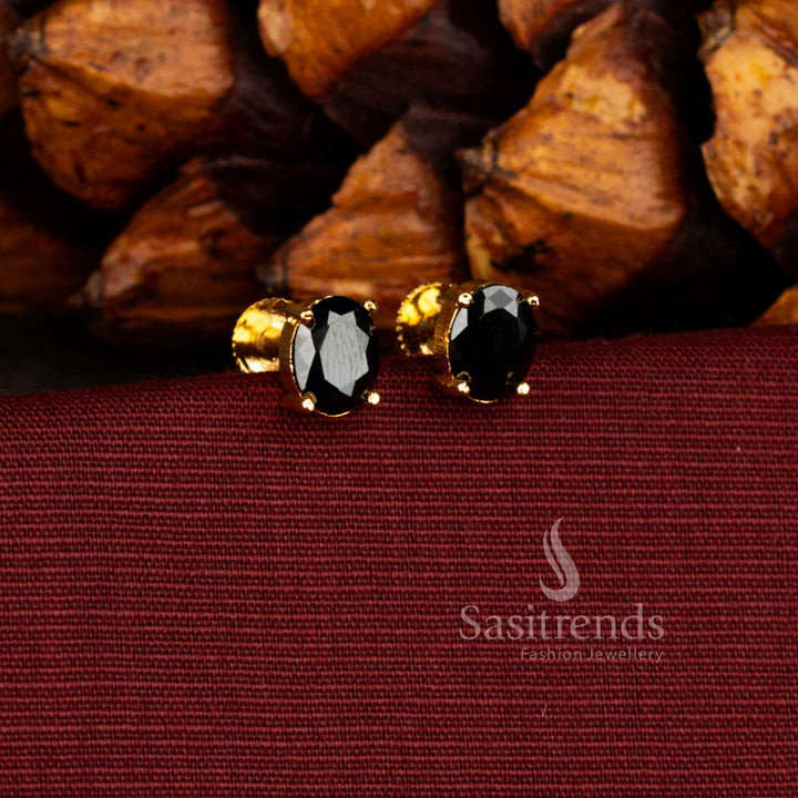 Micro gold plated oval black stud earrings with structured prong setting suitable for saree, kurti and formal styling - Sasitrends