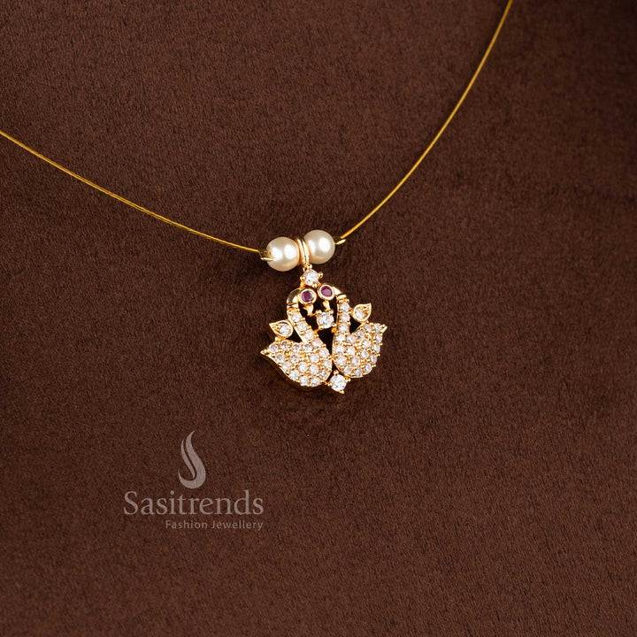 Sasitrends designer invisible American diamond 24K micro gold plated peacock pendant necklace crafted with elegant pearl bead chain structure for festive and cultural wear