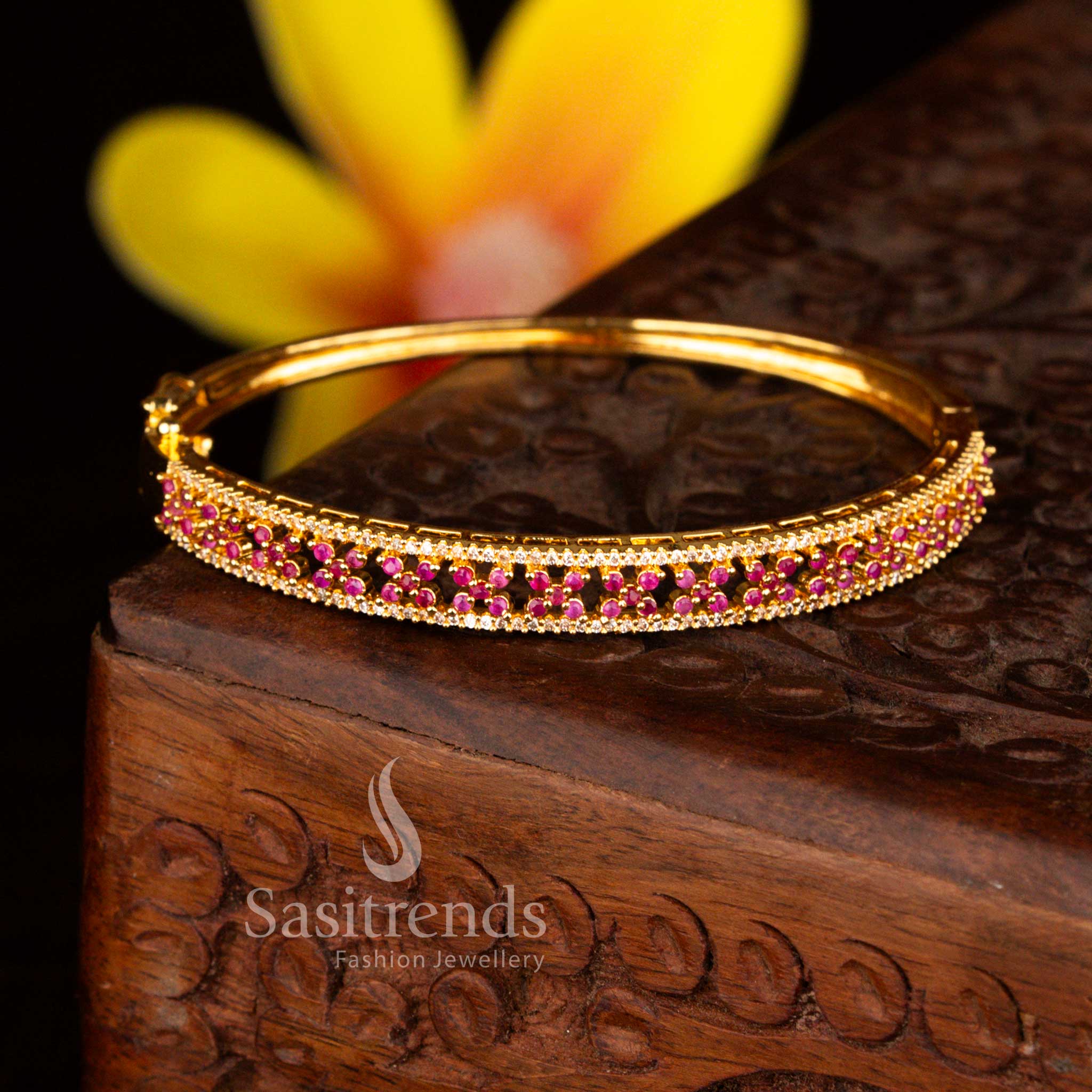 Sasitrends designer micro gold plated lattic two rows floral white ruby American diamond openable kada bracelet crafted with intricate stone detailing and elegant gold finish.