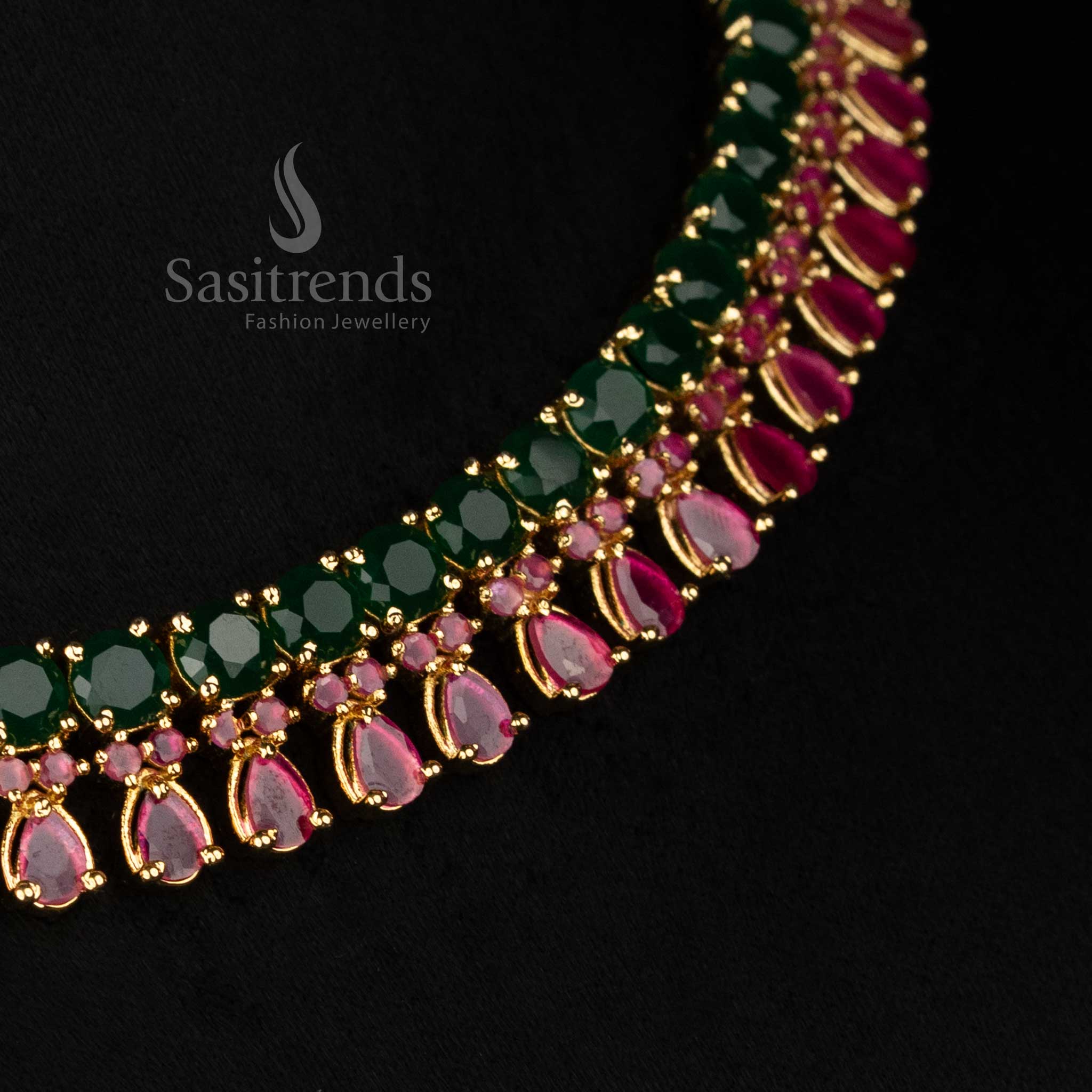 Sasitrends 24k micro gold plated ruby green american diamond necklace set with structured neckline and elegant teardrop stone detailing