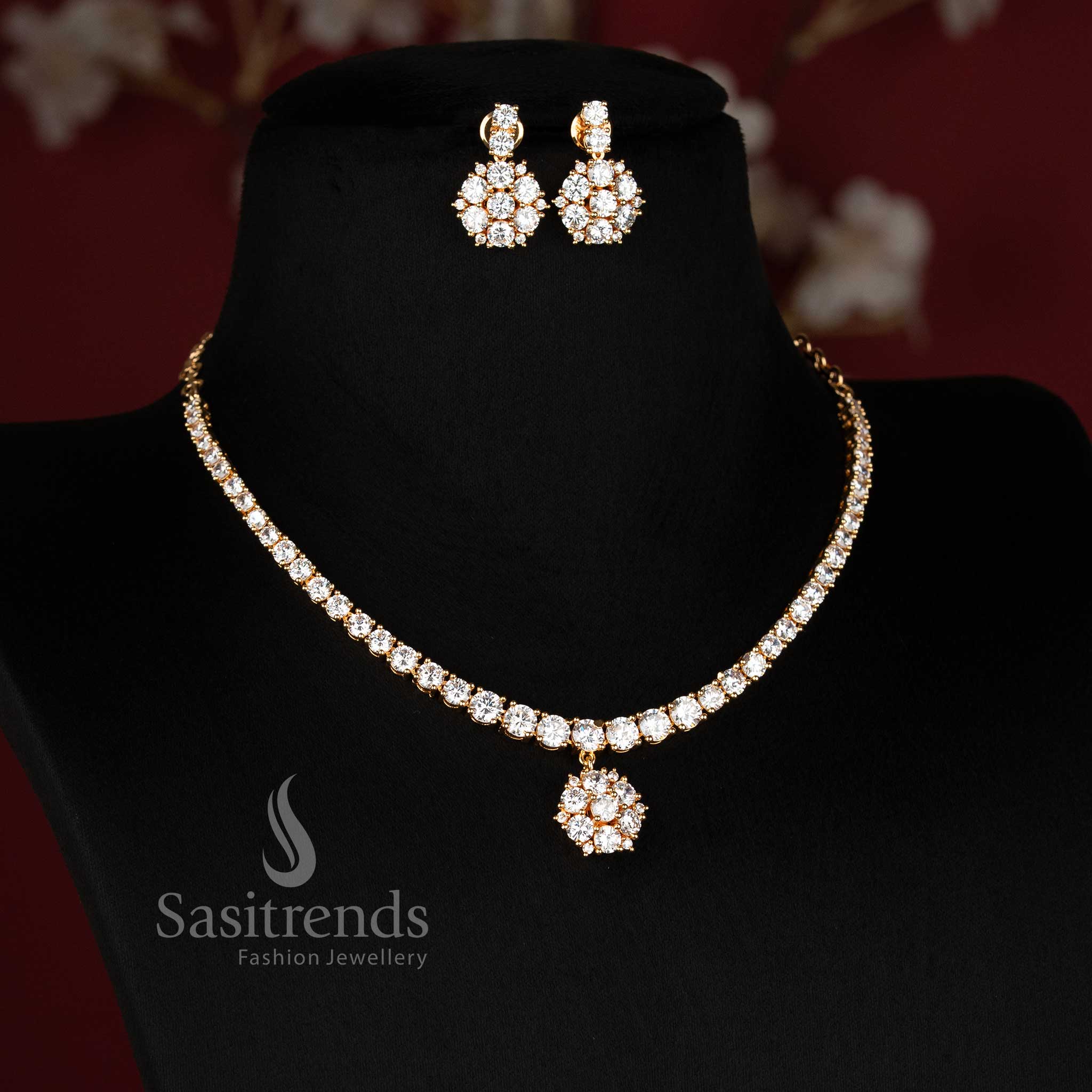 Sasitrends elegant fashion jewellery set featuring a continuous floral motif necklace and matching floral drop earrings 