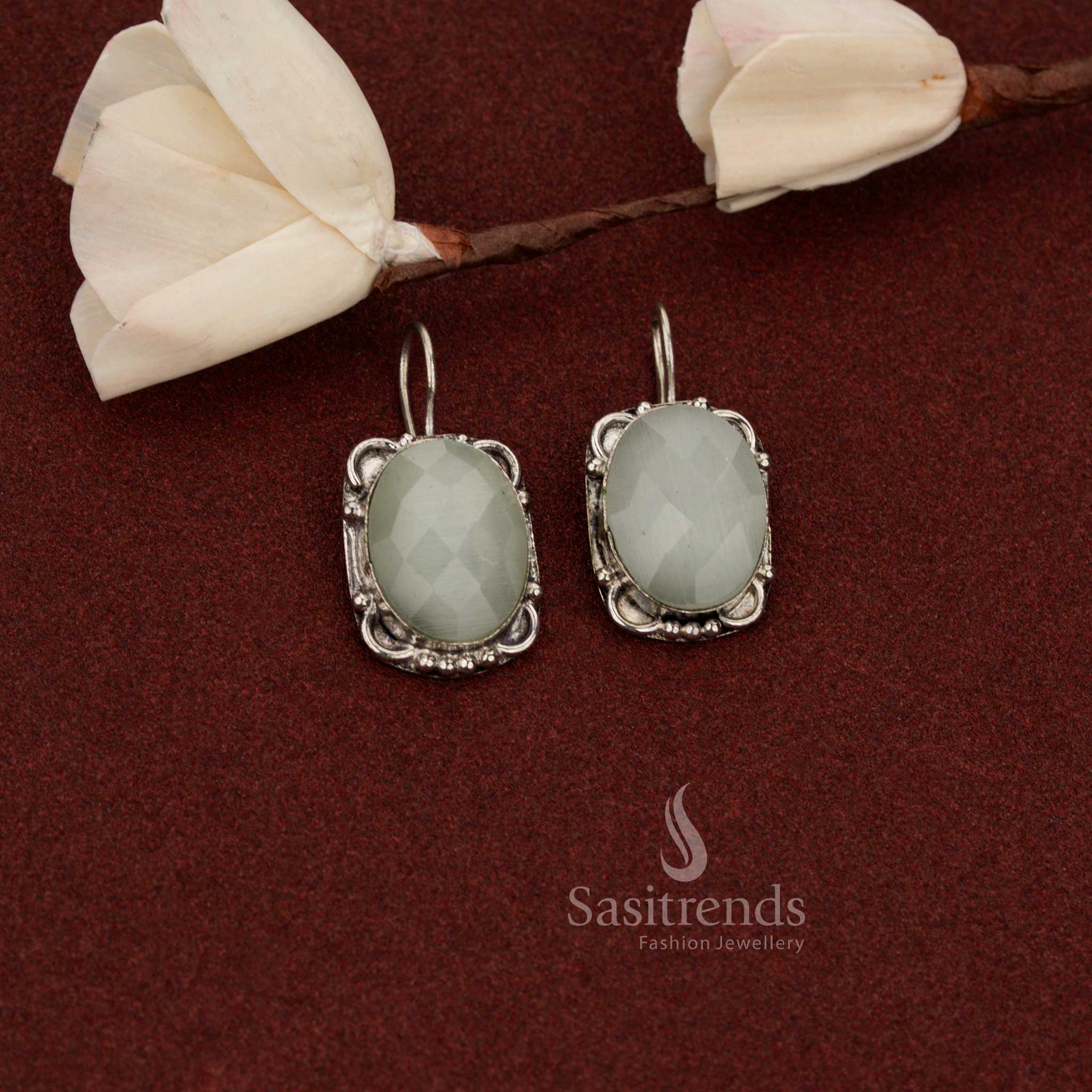 Sasitrends elegant white oxidised German silver earrings featuring oval faceted stone with floral frame suitable for office wear