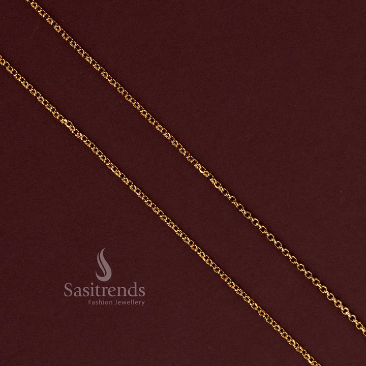 Sasitrends gold plated chain showcasing miniature elongated oval links connected in an alternating angled formation, creating an intricate repeating interlocking pattern
