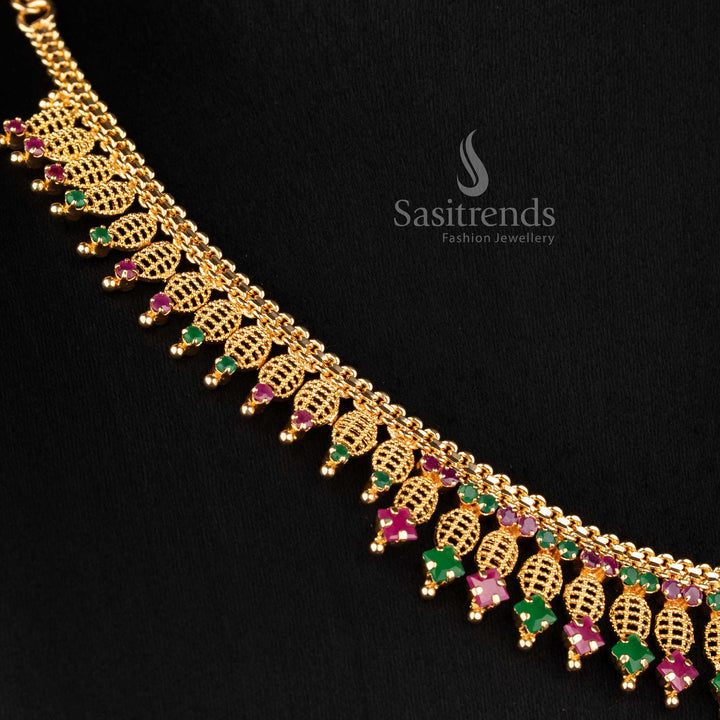 Sasitrends ethnic 24K micro gold plated leaf lattice necklace crafted with detailed ruby green AD stone work and decorative hanging drop pattern for traditional styling
