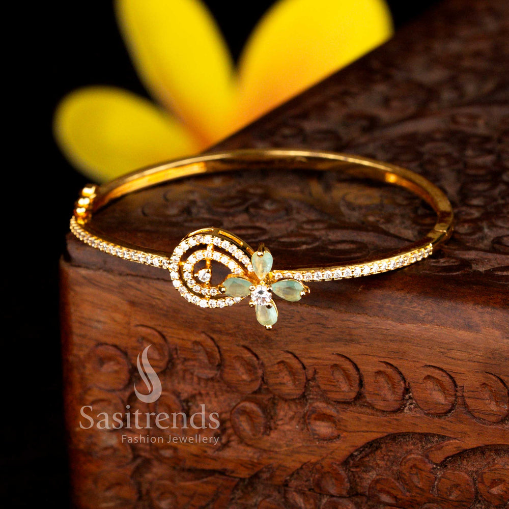 Sasitrends everyday elegance micro gold plated swirl motif floral accent white mint American diamond openable kada bracelet offering subtle sparkle and rich gold appearance.