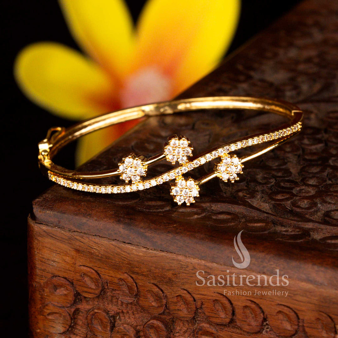 Sasitrends exclusive micro gold plated four floral-shaped crystal clusters white American diamond guaranteed openable kada bracelet featuring precision stone setting and a radiant real gold look finish perfect for festive and wedding styling.