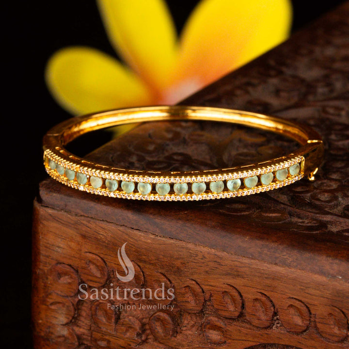Sasitrends festive micro gold plated two rows of petite white mint American diamond openable kada bracelet designed to enhance sarees and traditional outfits with radiant shine.