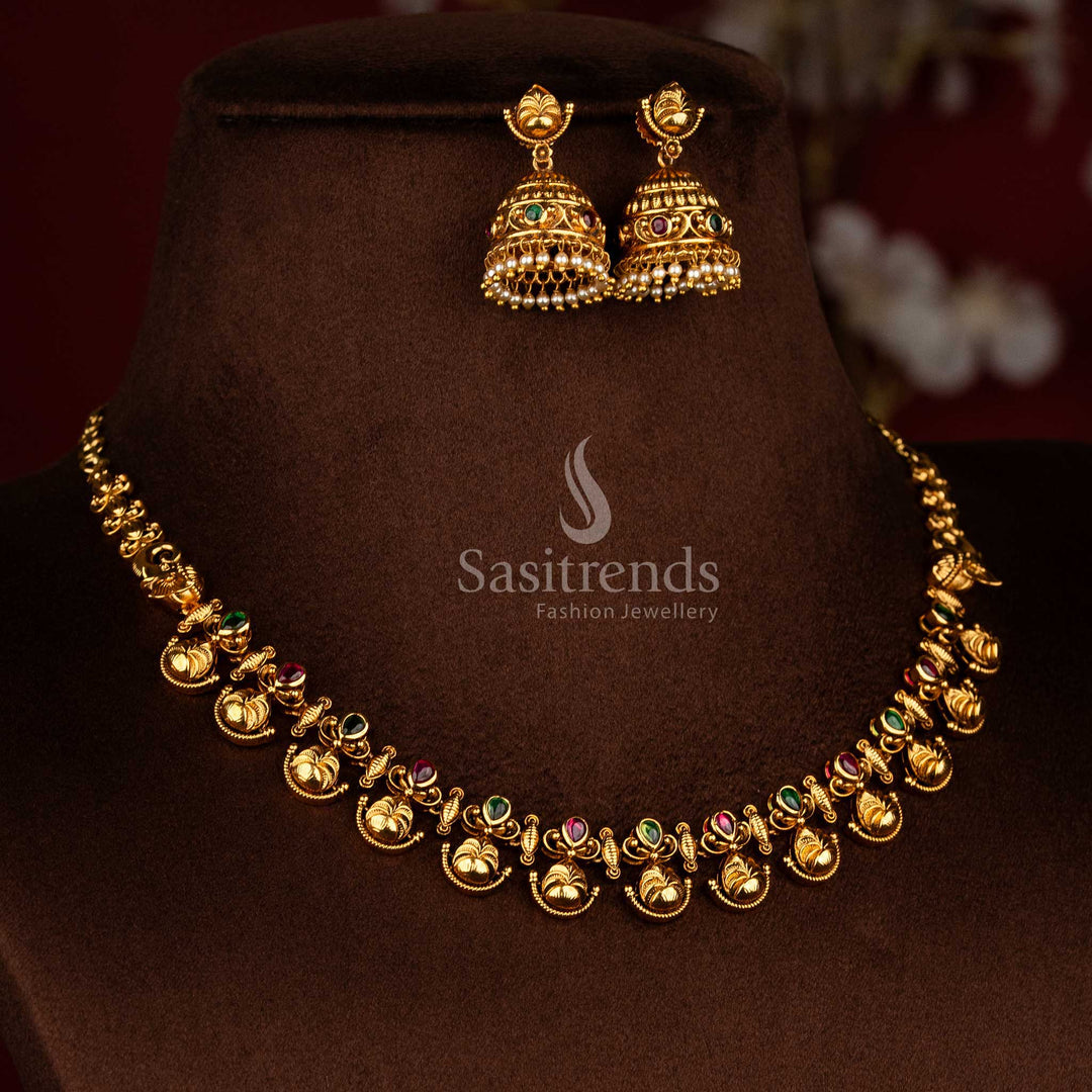 Sasitrends classic temple jewellery necklace set showcasing floral and leaf motif structure with bead drops and premium matte gold plating and ruby green AD stone