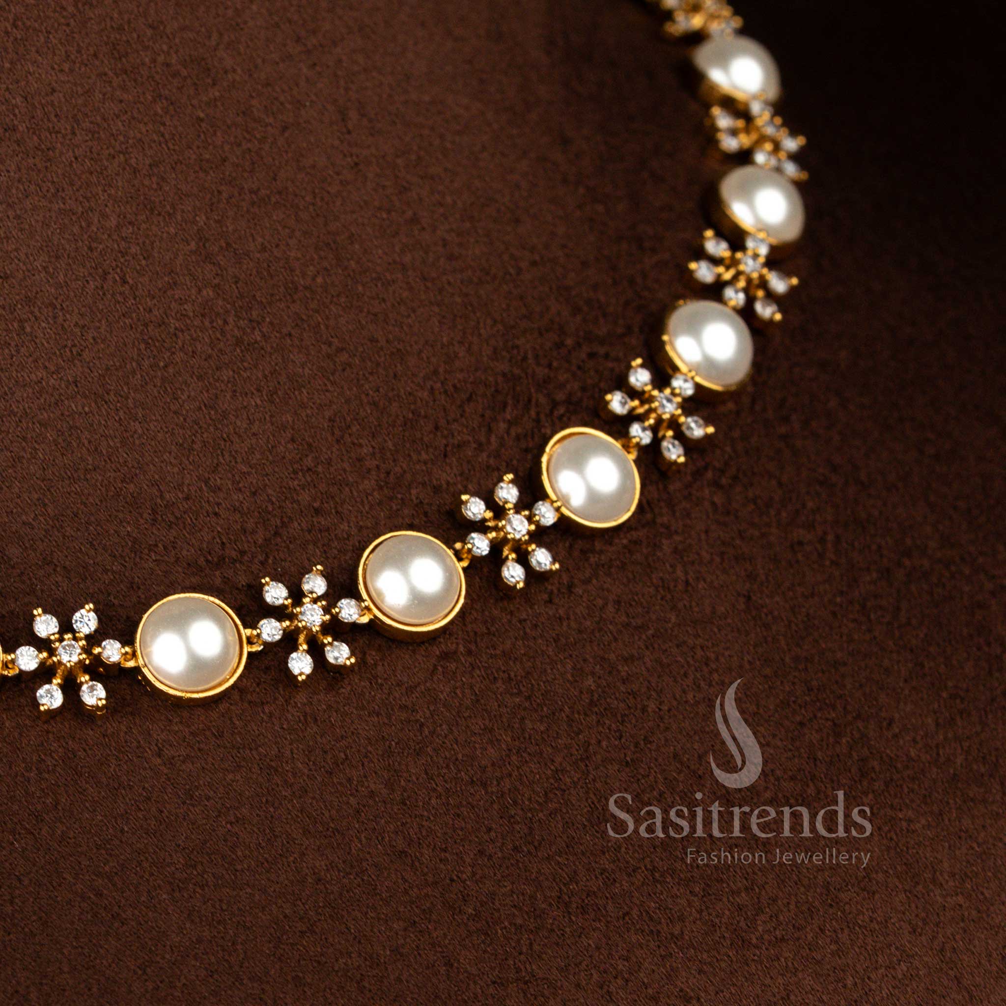Elegant matte gold white American Diamond and pearl necklace with matching pearl drop earrings