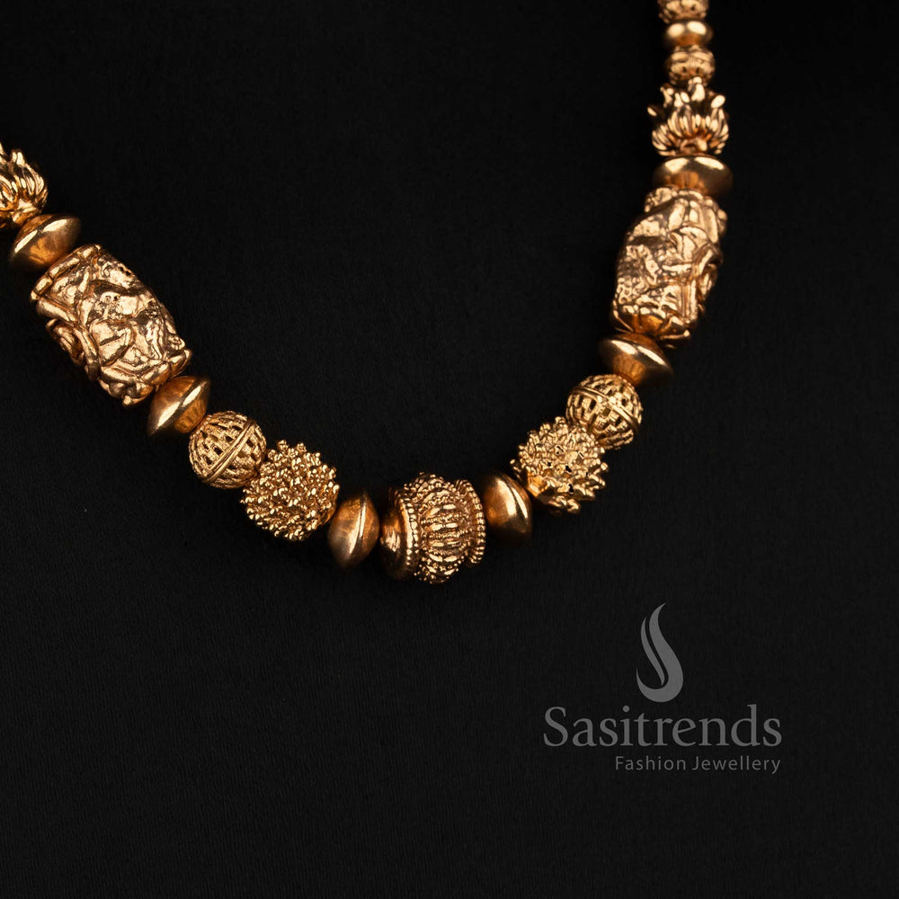 Sasitrends Goddess Lakshmi barrel and textured golden bead strand mala necklace set with matching floral stud earrings
