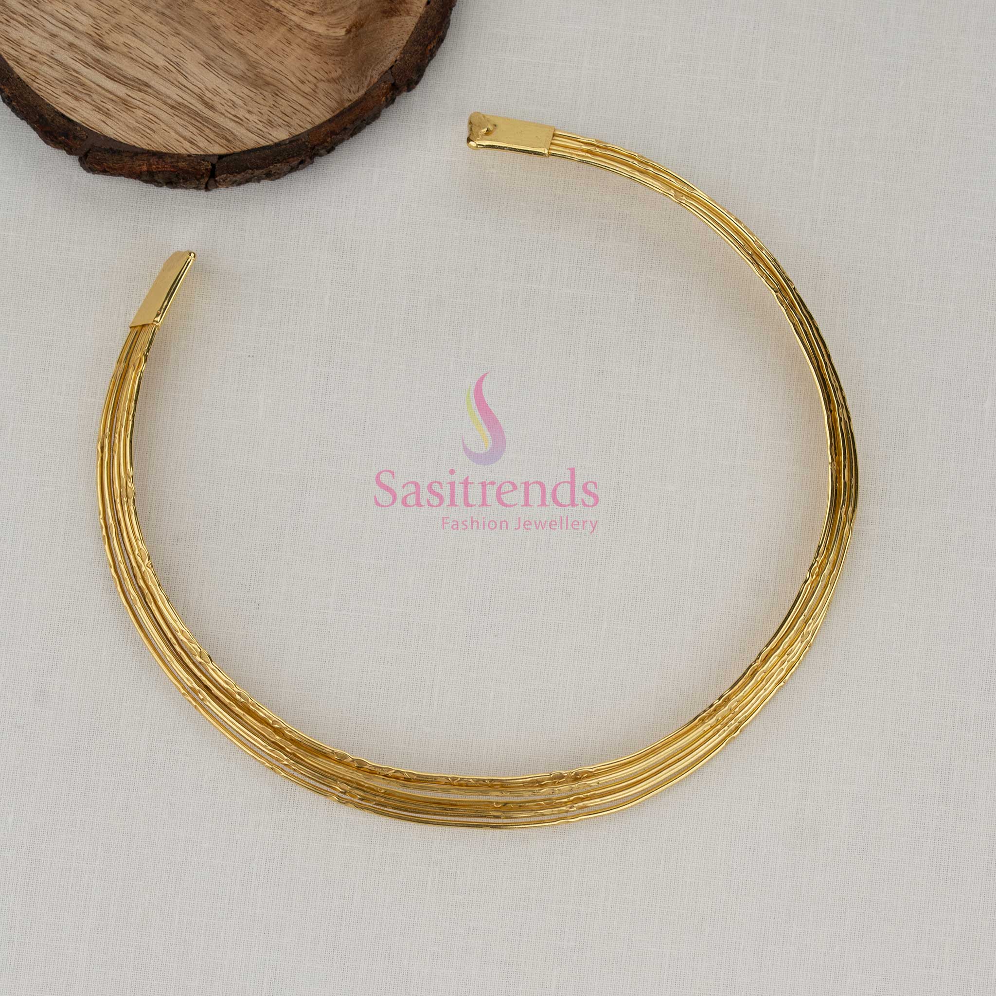 Chic gold plated layered husli collar necklace crafted with sleek wire detailing perfect for festive outfits temple occasions and cultural events - Sasitrends