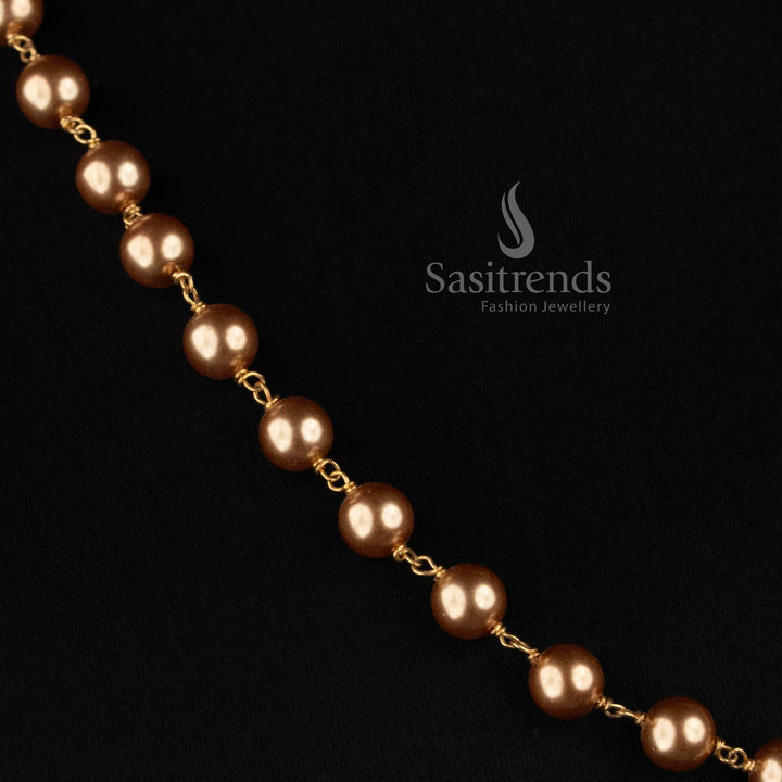 Sasitrends traditional golden pearl beaded necklace with graduated pearl structure and decorative centre drop jewellery design 