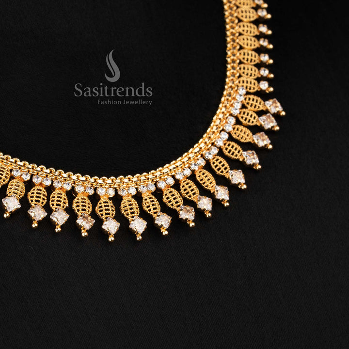 Sasitrends grand 24K micro gold plated intricate leaf lattice necklace crafted with white AD stone detailing and hanging drop pattern for festive and heritage styling