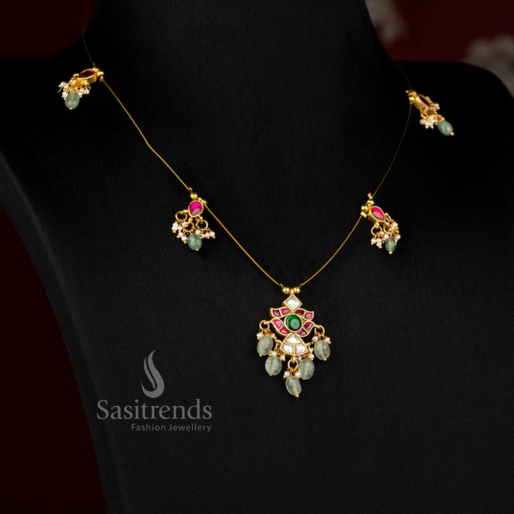 Sasitrends grand jadau invisible chain 24K gold plated necklace designed with intricate motif pattern and delicate pearl touch suitable for elegant saree styling