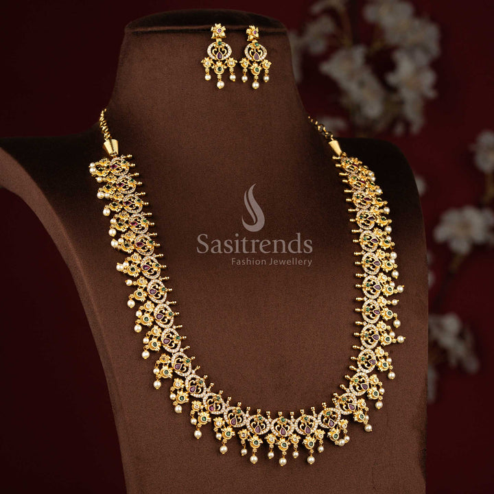 Sasitrends grand temple matte gold plated peacock teardrop floral motif pearl drop multi AD stone long necklace jewellery set featuring elegant temple craftsmanship for engagement rituals, poojas and cultural occasions