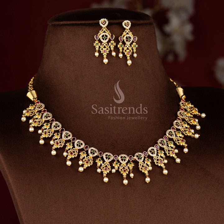 Sasitrends grand temple matte gold plated peacock teardrop floral motif pearl drop multi AD stone short necklace jewellery set featuring elegant temple detailing for engagement rituals, poojas, festive observances and heritage celebrations