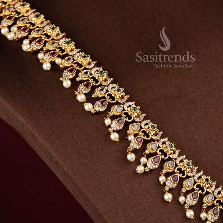 Sasitrends grand temple matte gold plated teardrop motif floral multi AD stone long haram necklace jewellery set crafted for bridal wear, engagement ceremonies, parties, festive gatherings and special occasions