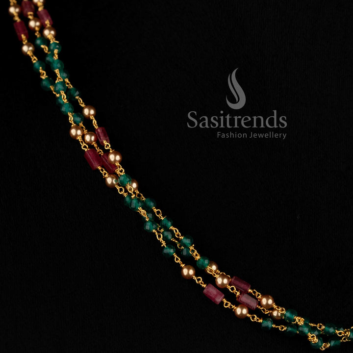 Three-strand beaded necklace with Cubic Zirconia stones and colourful green and pink accents 