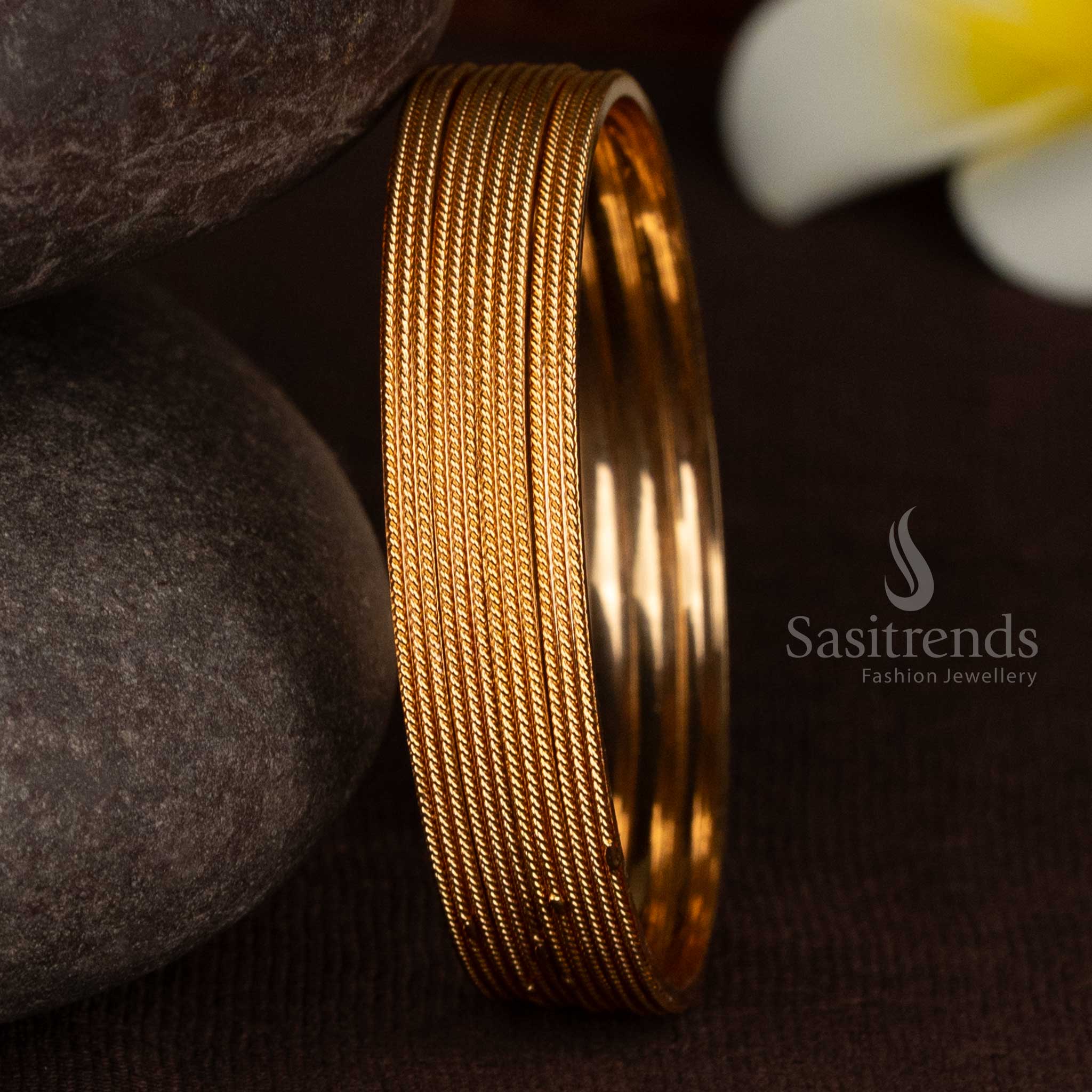 Sasitrends 24k micro gold plated bangle with linear rope textured design and smooth inner structure
