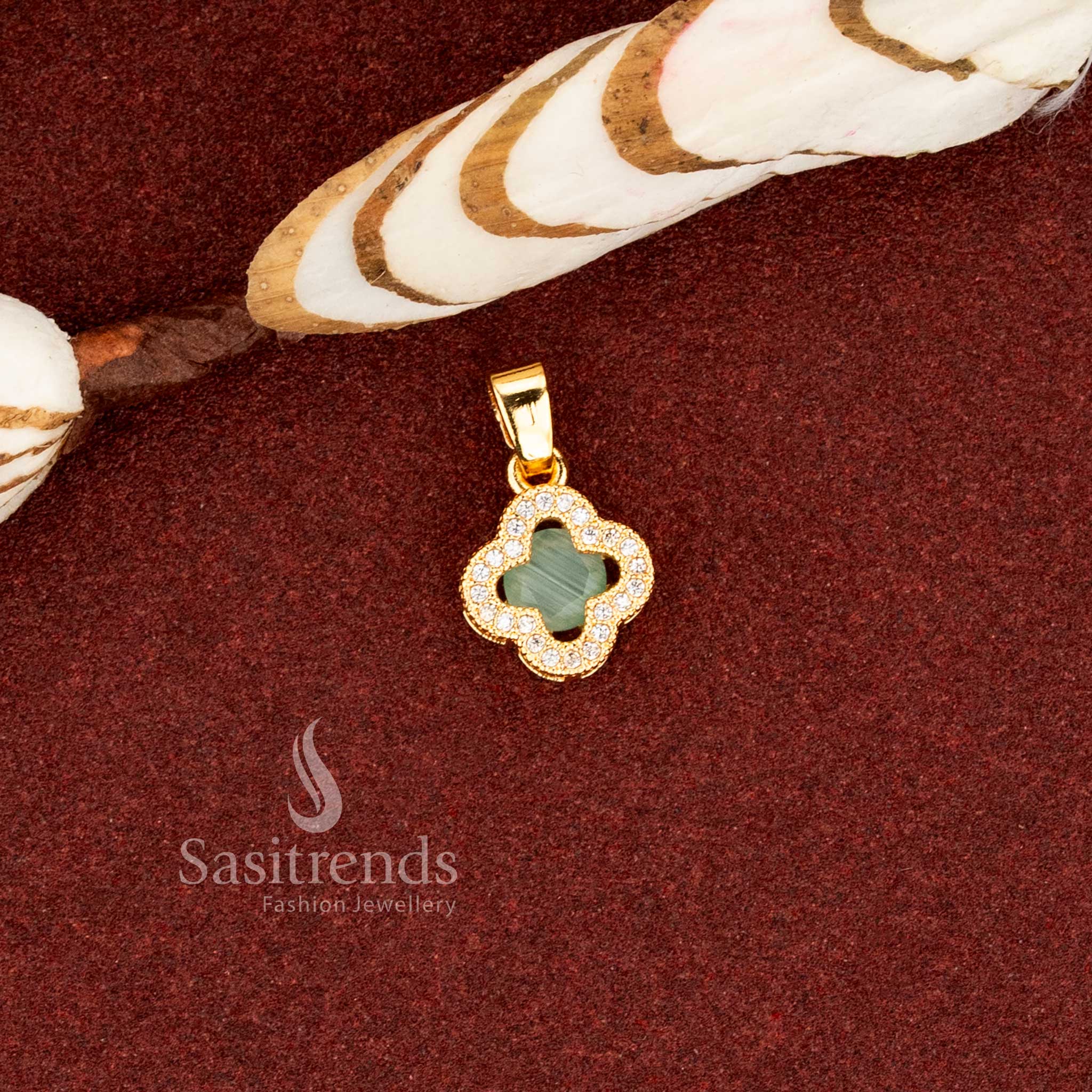 Sasitrends guaranteed 24K micro gold plated mint AD stone floral clover design pendant featuring a layered stone frame structure with intricate detailing crafted in real gold look 1 gram jewellery finish, 
