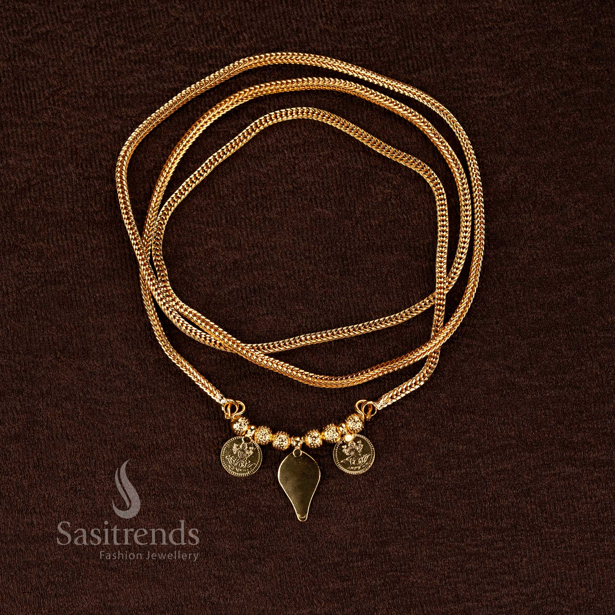 Sasitrends 24K micro gold plated traditional thali chain featuring woven chain structure with Lakshmi coin motifs and bead centre pendant design