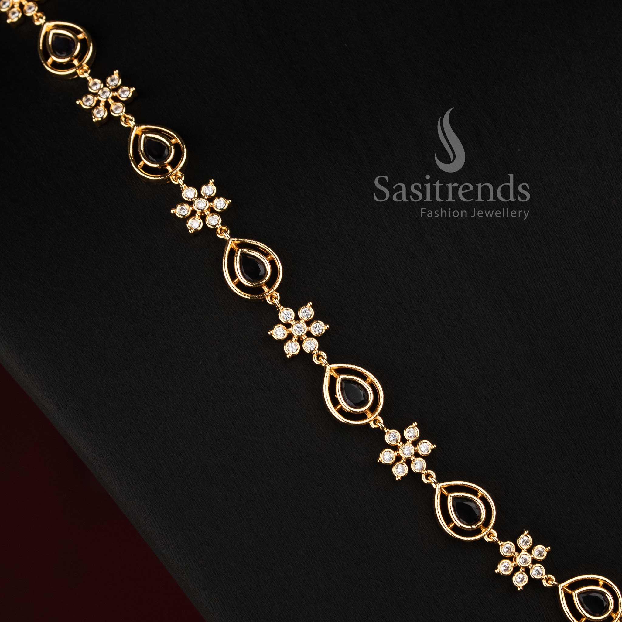 Sasitrends Impon Addigai short and long AD stone necklace with floral-inspired detailing, pear-shaped settings and matching floral earrings 