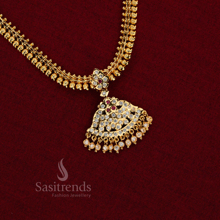 Traditional Impon one gram micro gold plated gati necklace featuring classic mango chain design and dangling white ruby AD stone drops