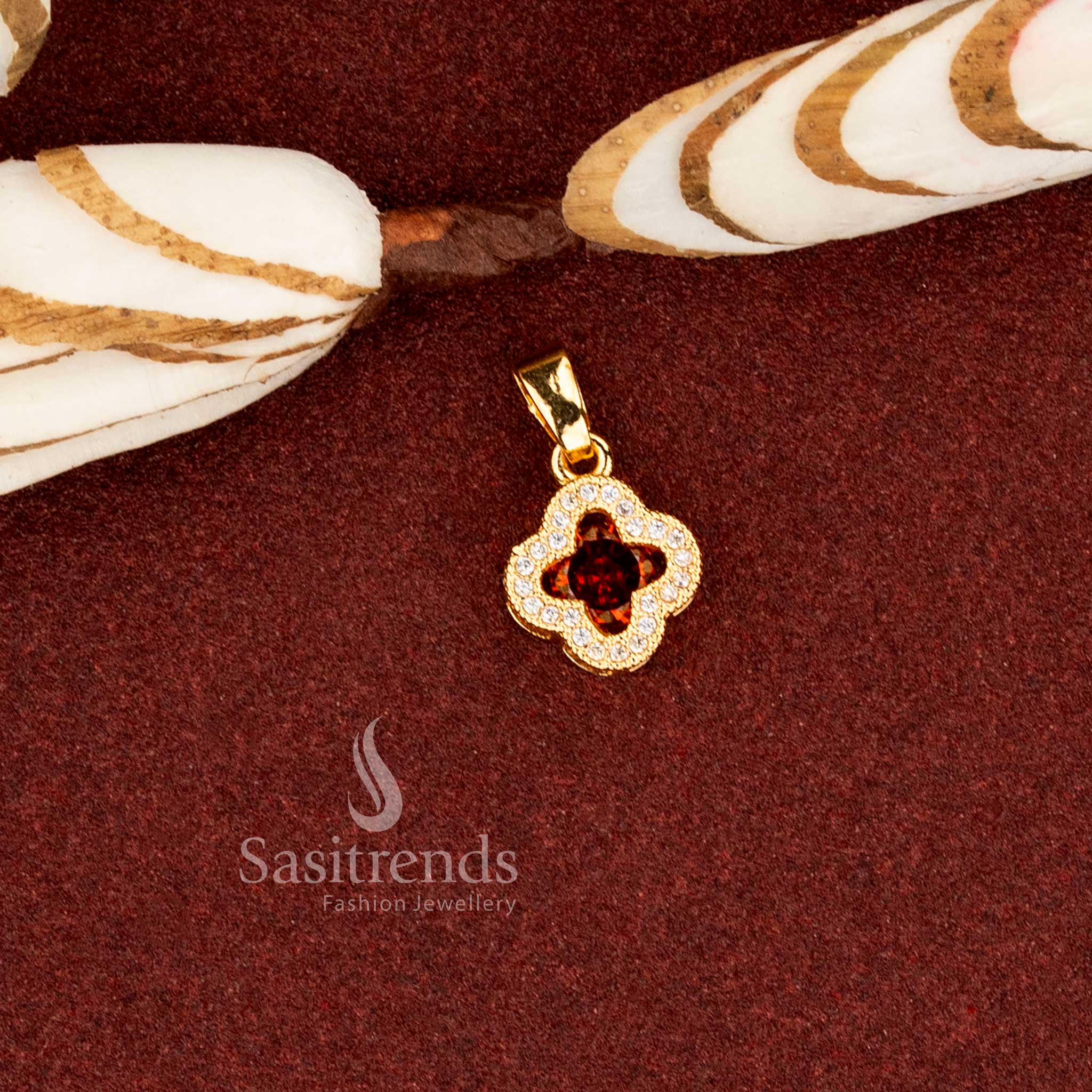 Sasitrends guaranteed micro gold plated garnet AD stone clover floral pendant crafted with a structured layered stone frame and refined craftsmanship delivering a rich real gold look finish