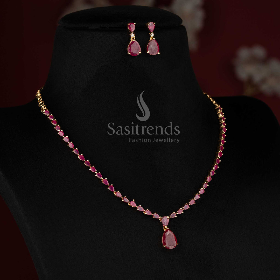 Sasitrends 24k micro gold plated ruby American diamond necklace set with teardrop linked chain and centre drop pendant 