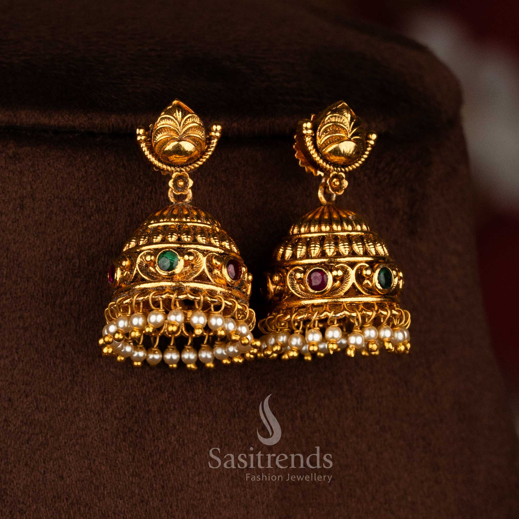 Sasitrends elegant temple style floral leaf motif necklace set enhanced with ruby green AD stones, refined craftsmanship, and a luxurious ethnic look