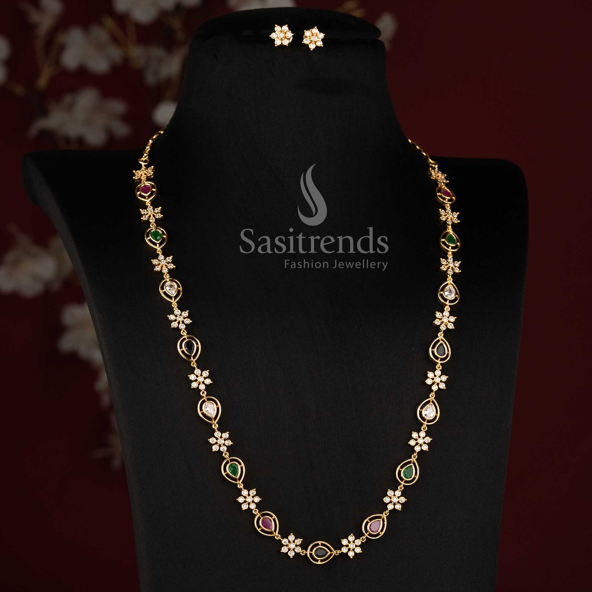 Sasitrends Impon Addigai necklace designed with repeating floral stone sections, pear-shaped motifs and an elegant short and long arrangement 