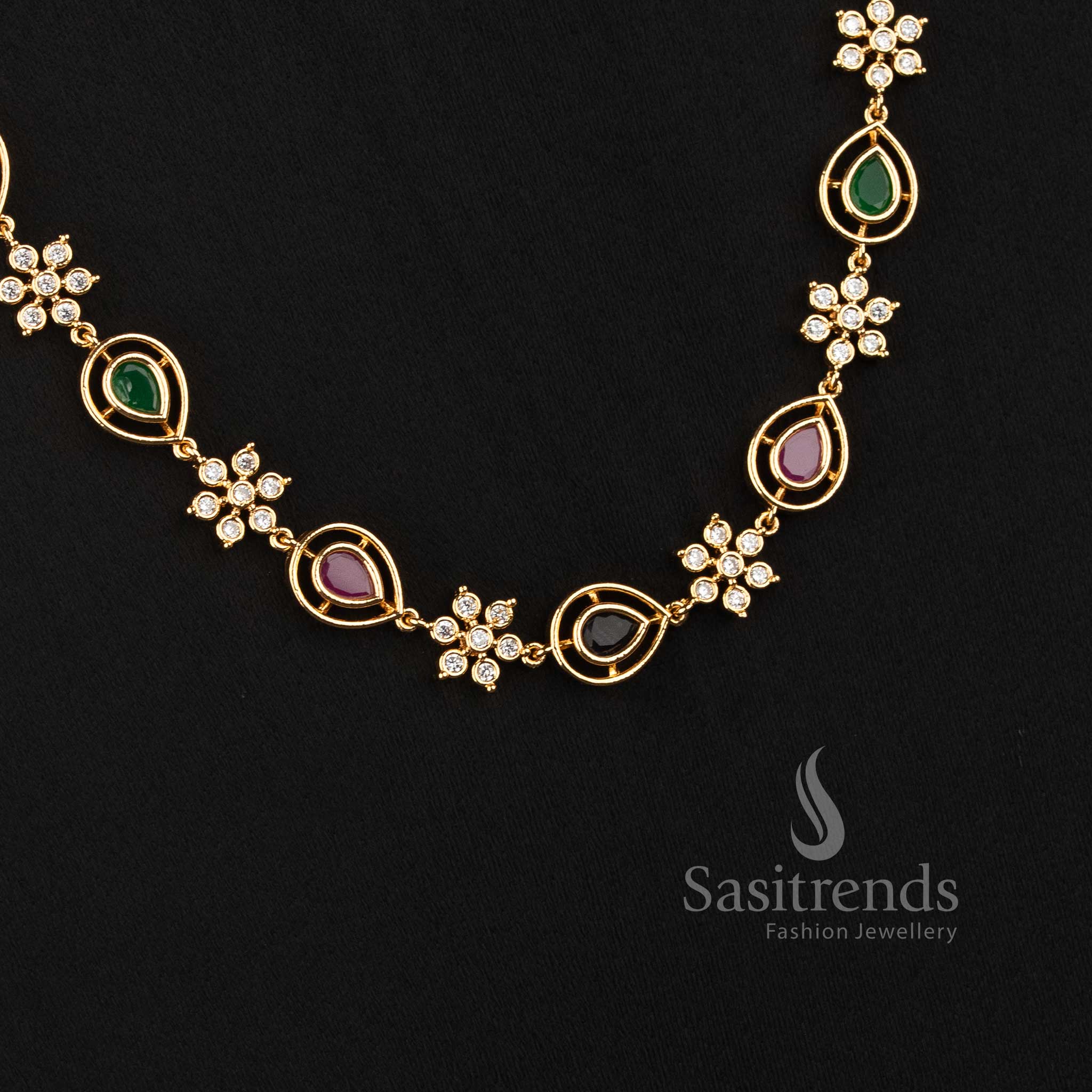 Sasitrends Impon Addigai 24K pure gold plated jewellery featuring connected floral motifs and pear-shaped AD stone elements across the necklace 