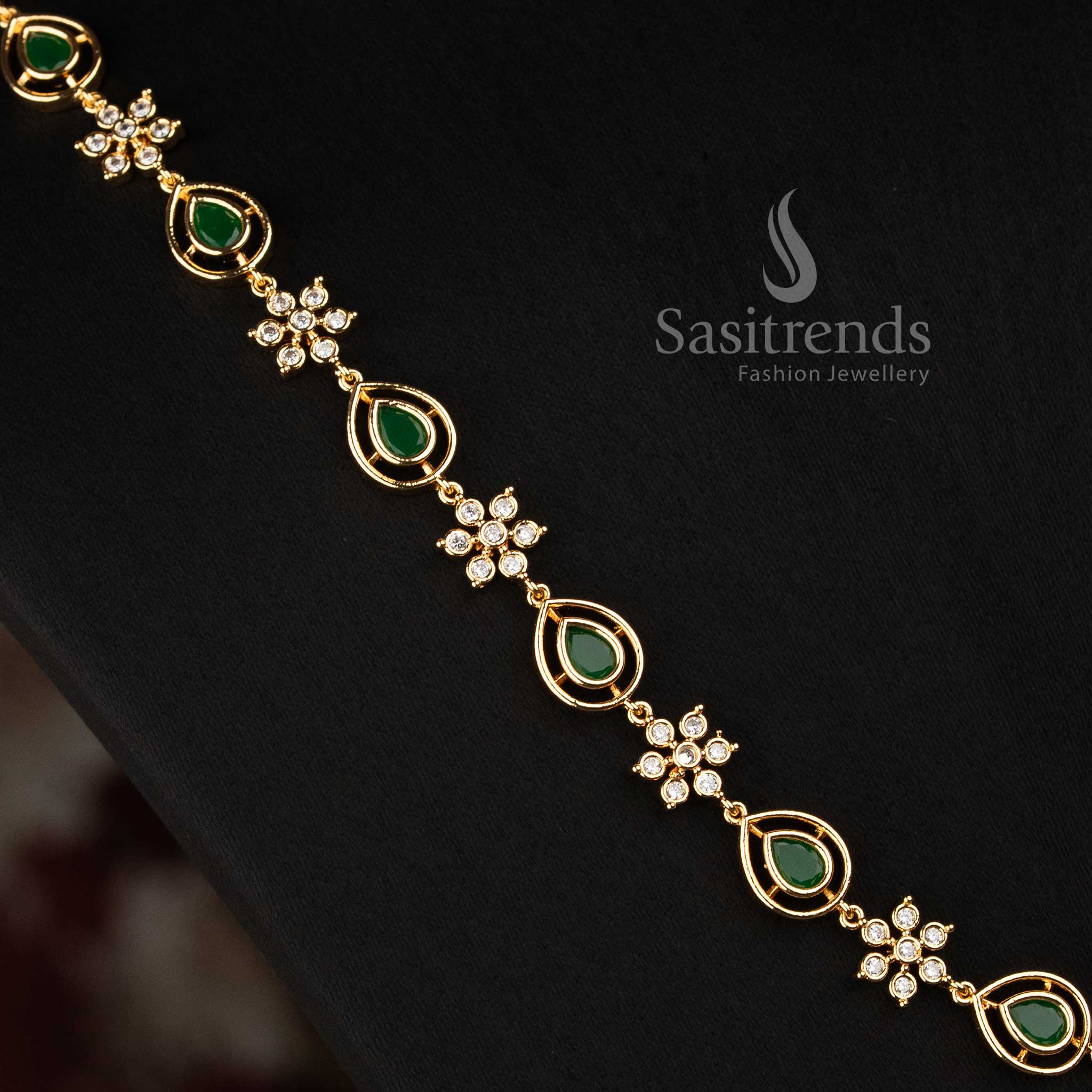 Sasitrends Impon Addigai AD stone necklace showcasing a balanced floral arrangement, circular frames and elongated pear-shaped jewellery details 