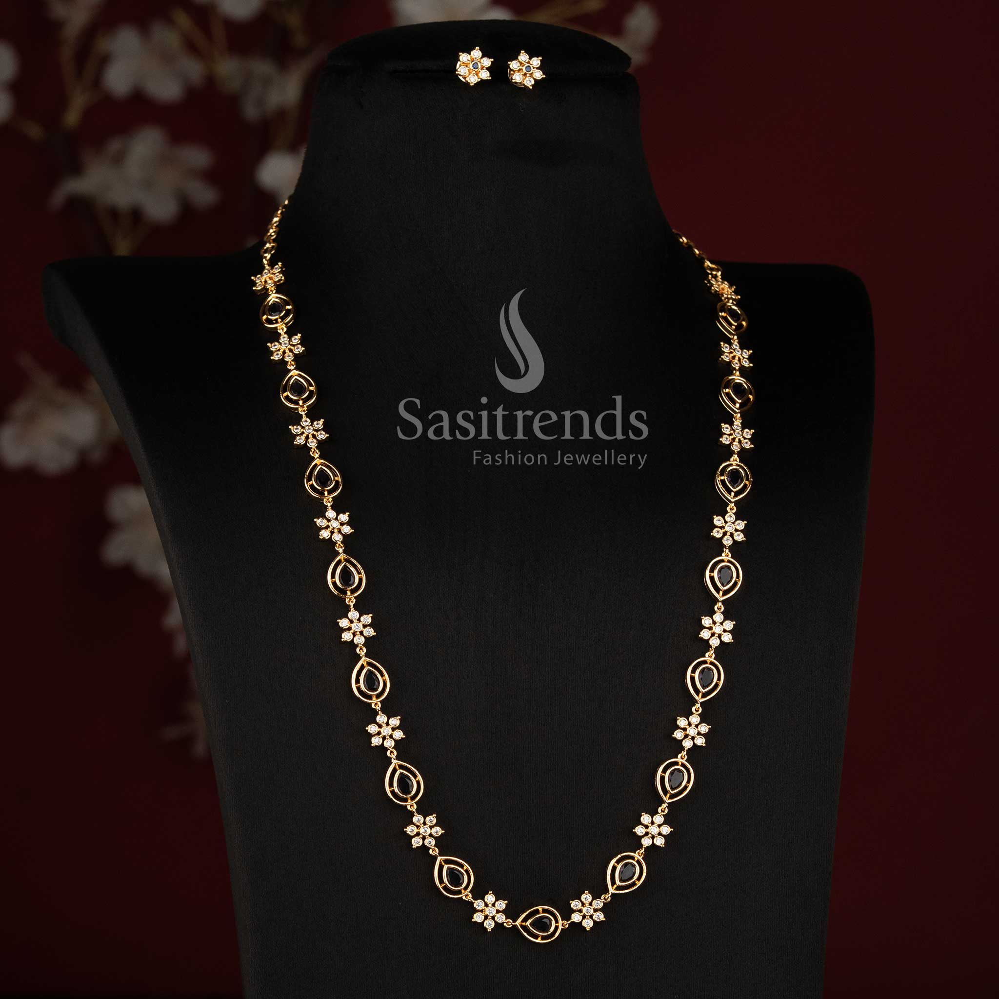 Sasitrends micro gold plated Impon Addigai jewellery set showcasing a refined floral necklace structure with pear-shaped AD stone accents 