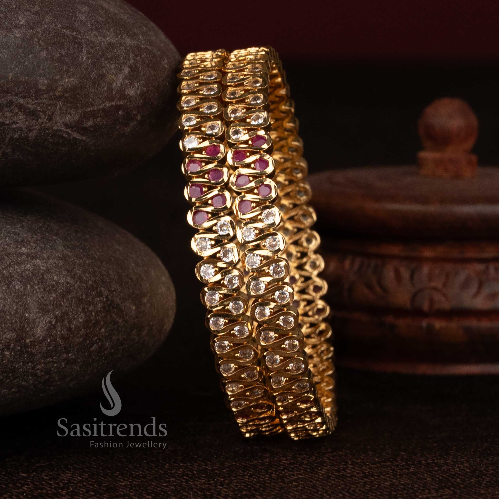 Sasitrends impon micro gold plated S-curve bangle designed with white ruby AD round stone setting crafted for festive traditional wear and elegant jewellery styling