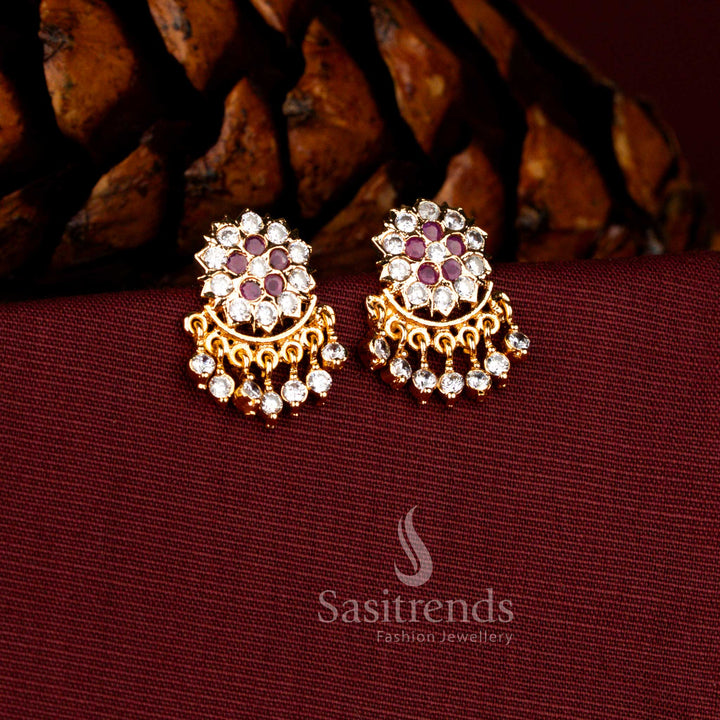 Sasitrends Impon micro gold plated white ruby AD stone circular floral cluster hanging earrings featuring detailed round motif with sparkling stone drops, traditional bridal wedding jewellery with premium real gold like shine.
