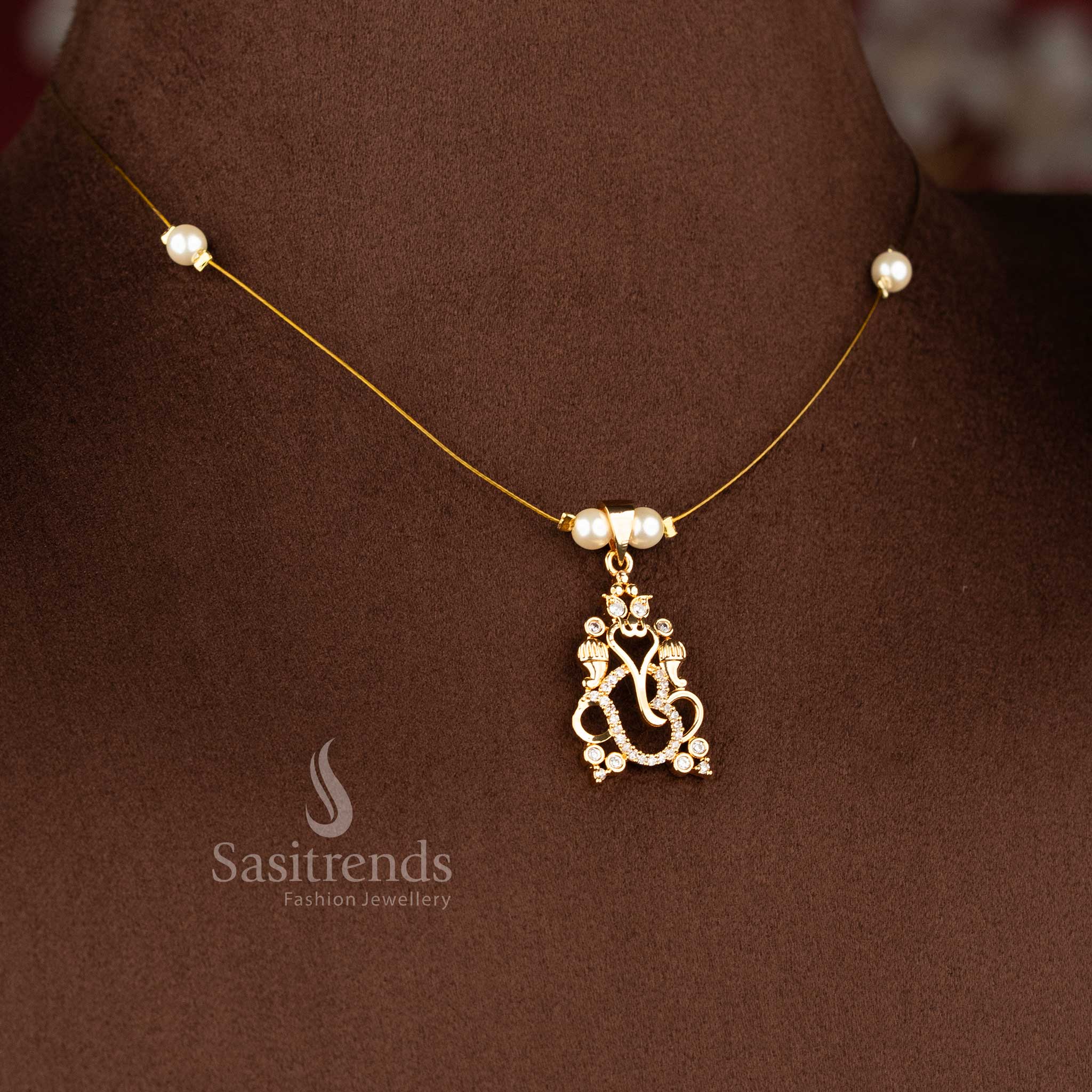 Sasitrends elegant American diamond vinayagar motif pendant necklace with pearl bead accents 24K gold plated fashion jewellery