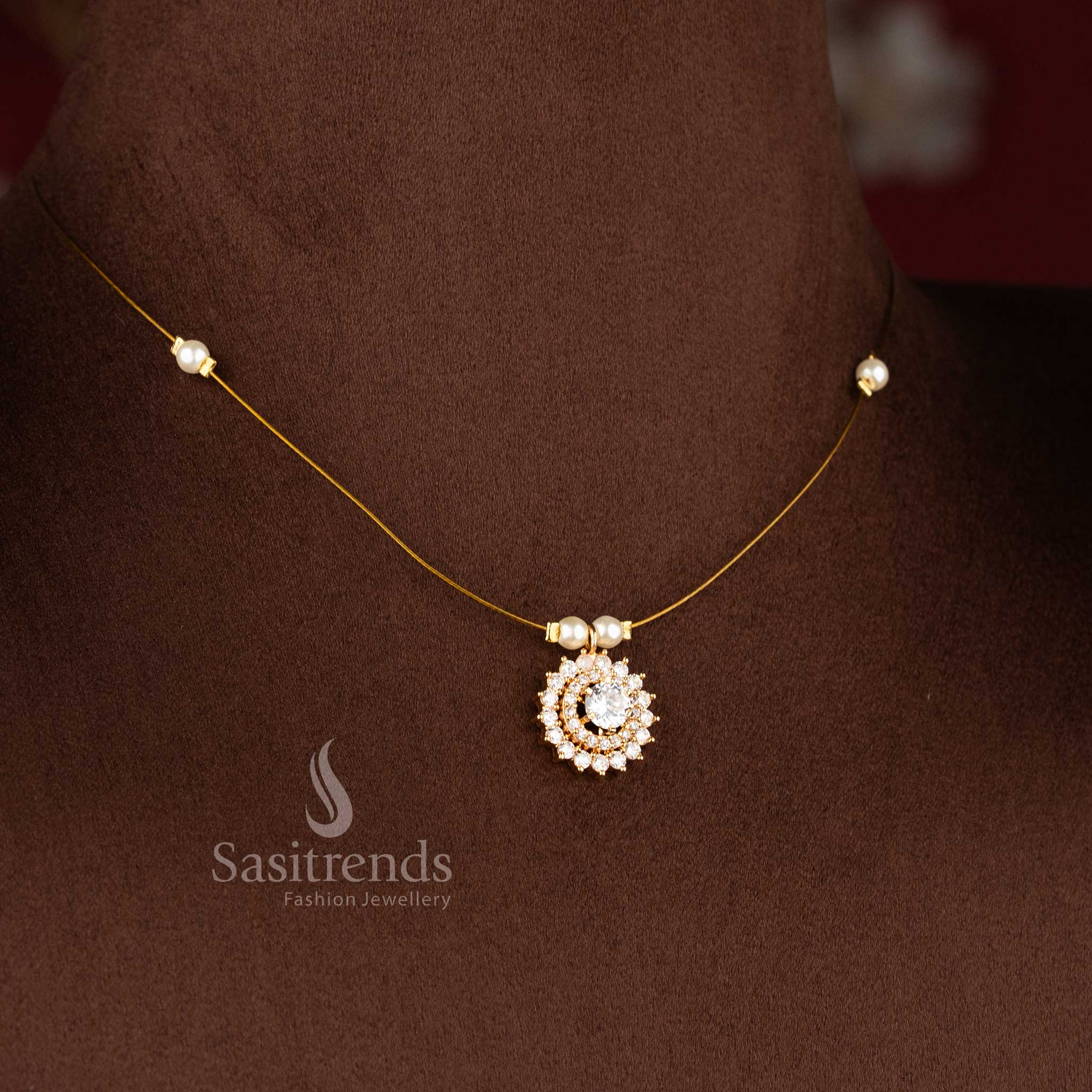 Sasitrends invisible American diamond 24K micro gold plated pendant necklace featuring delicate pearl bead chain structure designed for celebration and fashionable ethnic wear