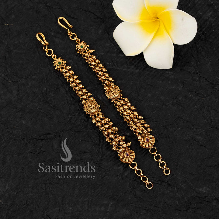 Traditional matil with Lakshmi motif combined with\ gold beads for rich bridal and festive styling - Sasitrends 