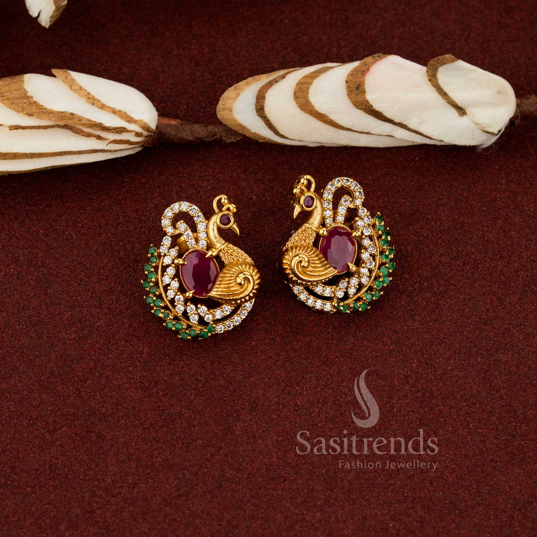 Divine temple matte gold plated AD peacock stud earrings designed for ethnic wear festive styling ruby - Sasitrends