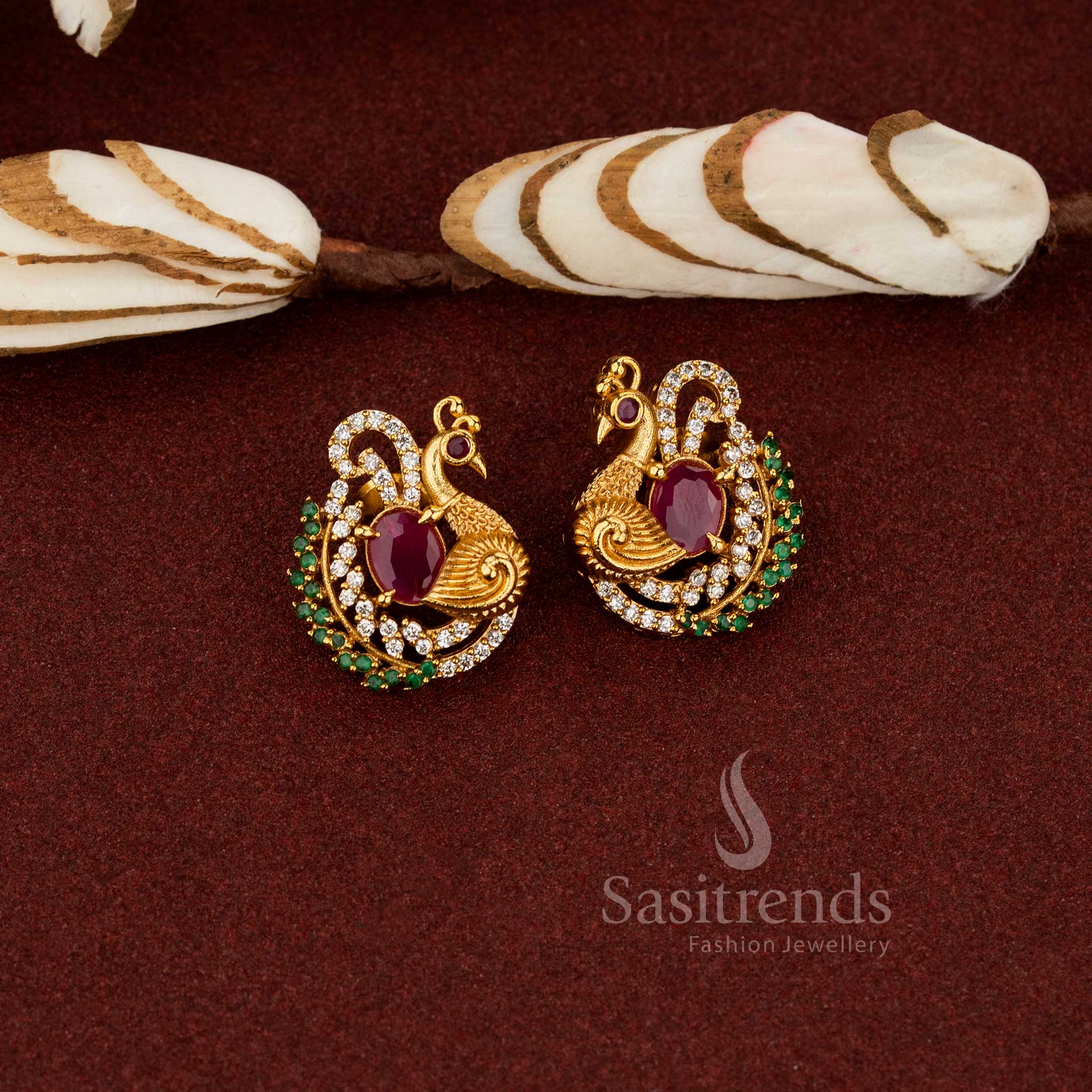 Divine temple matte gold plated AD peacock stud earrings designed for ethnic wear festive styling ruby - Sasitrends