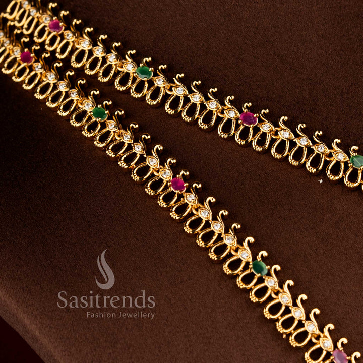 Sasitrends bridal temple matte gold plated multi AD stone necklace set with structured loop chain design and ornate floral peacock centerpieces 