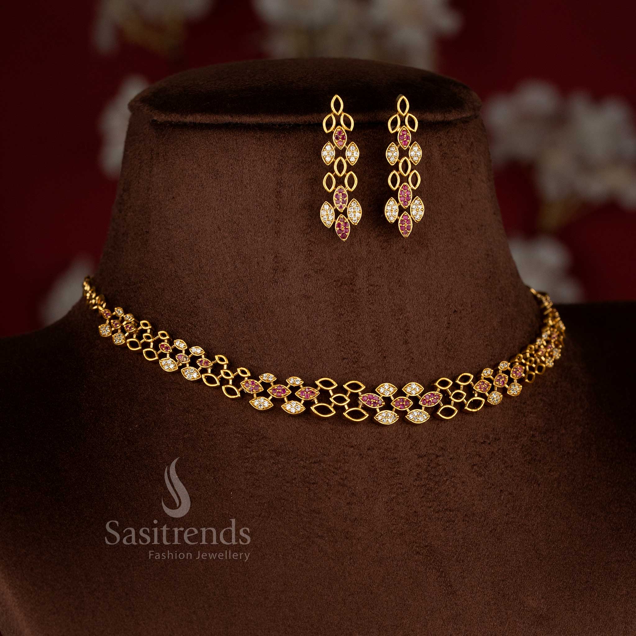 Sasitrends matte gold plated white ruby American Diamond geometric floral necklace set with rich traditional finish and premium ethnic look